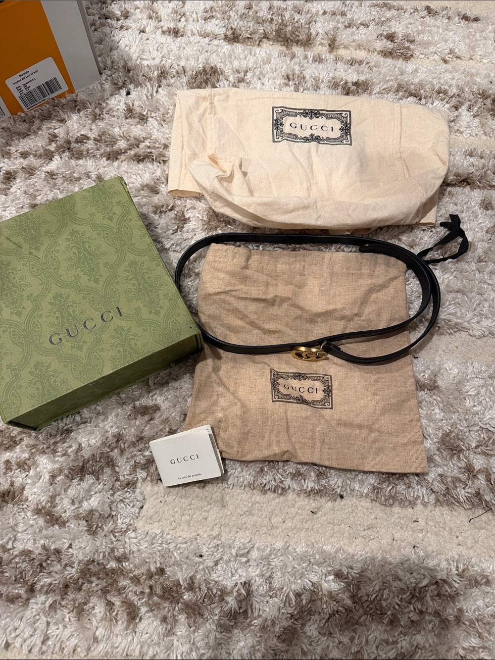 Gucci Black Leather Belt with Gold Interlocking GG Detail